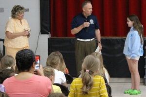 Pictured from left: Glen Dale Elementary Principal Kimberly Cain, Gabby Dantrassy and WV State Treasurer Regional Representative Tim Hooper.
